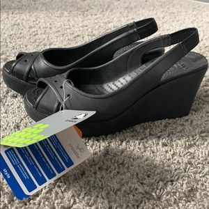 Crocs black platform wedge.